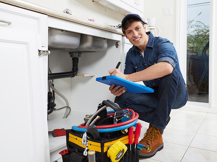 Plumber under sink